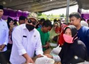 Sekda Hadiri Penyaluran 1.000 Paket Sembako di Desa Ilomangga